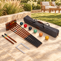 Elakai Hevea Rover Six Player Travel Croquet Set in an AI-styled outdoor setting