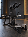 SFE plate-loaded V-Squat machine in a styled gym